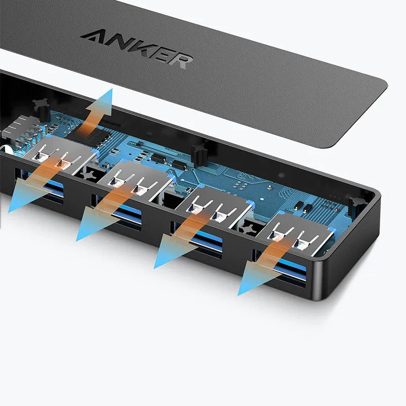Black Anker 4-port USB 3.0 hub with attached cable on a desk