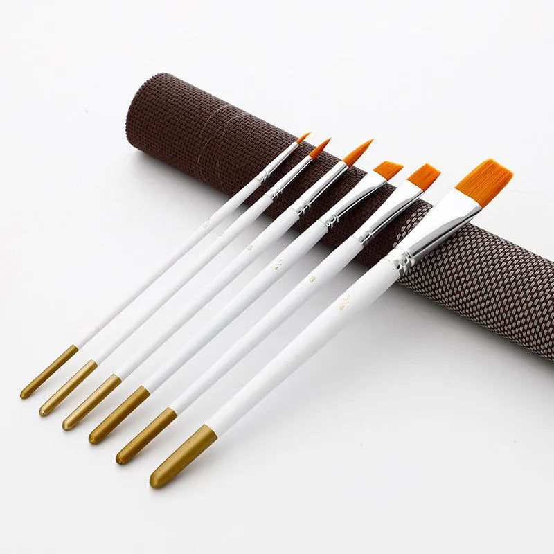 Set of six watercolour acrylic paint brushes with wood handles on a white background.