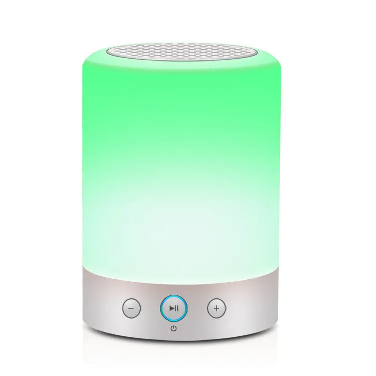 White mini portable Bluetooth sound light speaker with 5W output and touch controls on a surface