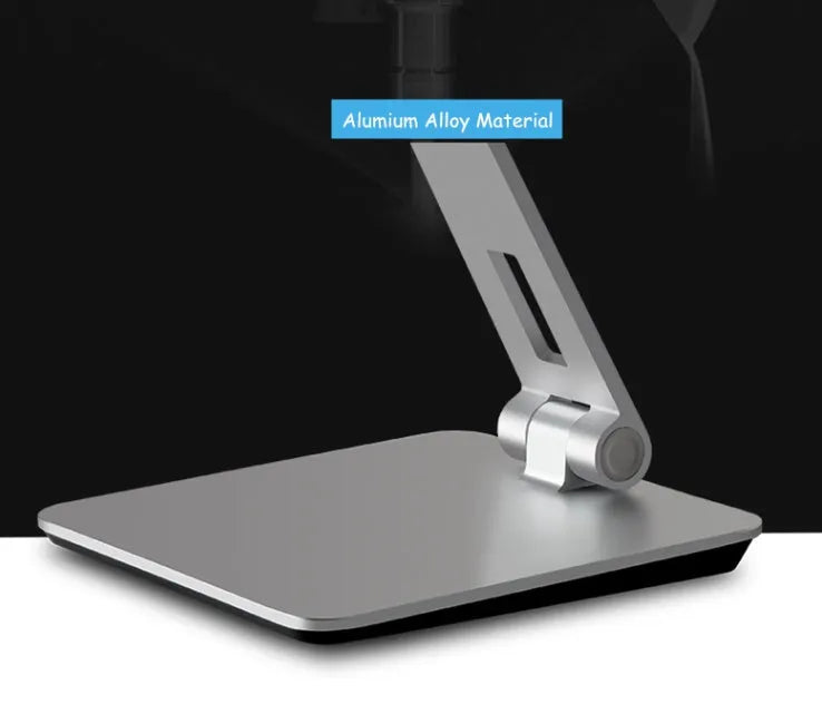 Silver aluminium folding phone and tablet stand on a desk, holding a tablet