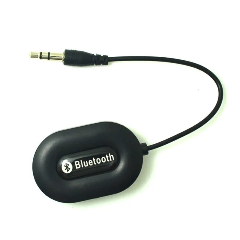 Black B5 Bluetooth music receiver with 3.5mm audio cable and USB charging cable
