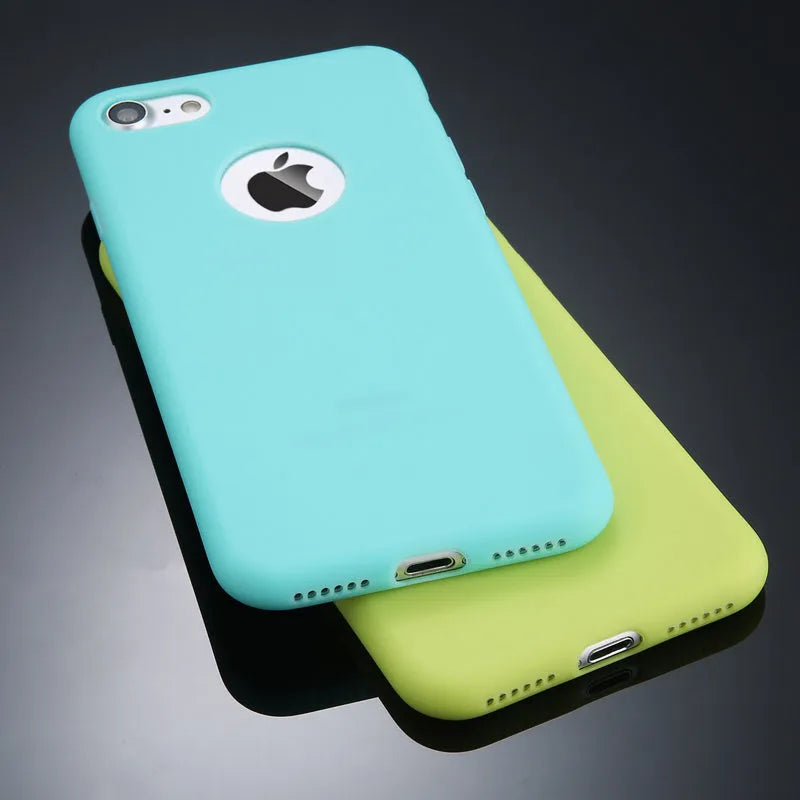 Soft silicone candy colour phone case for iPhone models on a plain background