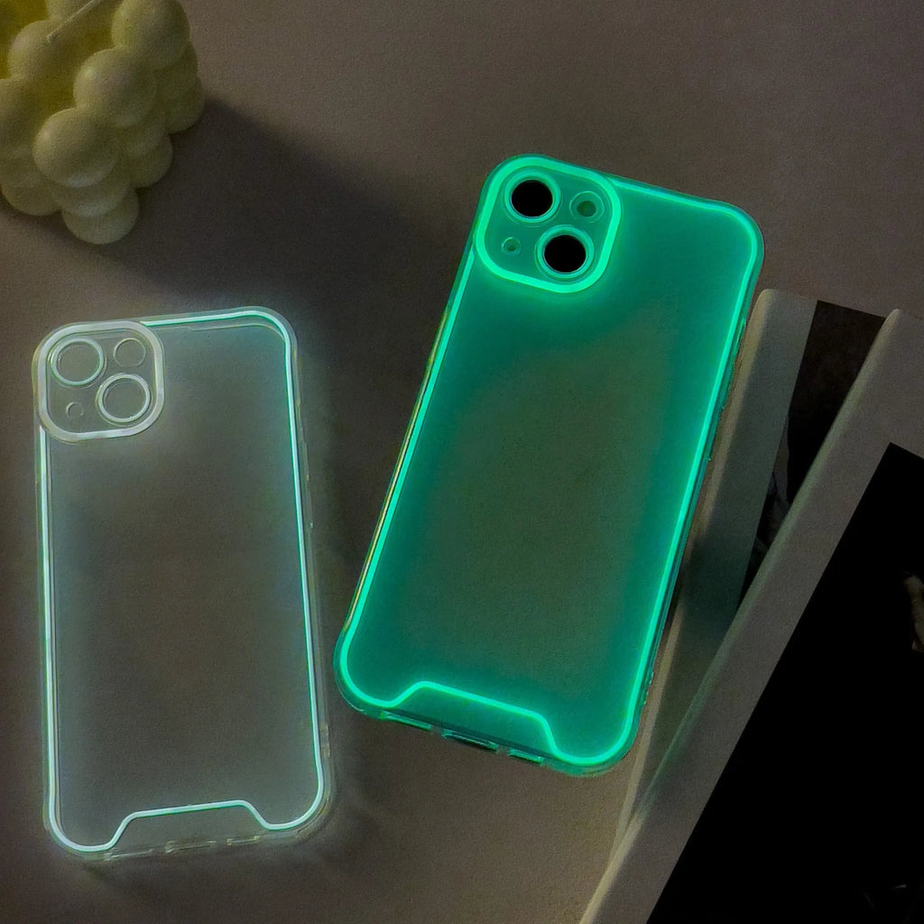 Glow in the dark soft TPU phone case for iPhone, shown in multiple colours including green, orange, and blue.