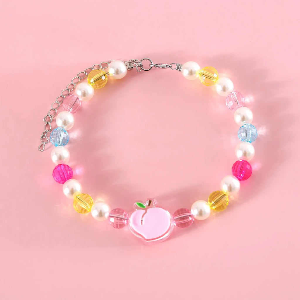 Colourful plastic bead necklace for small pets with peach, rainbow, or small flower pattern options.