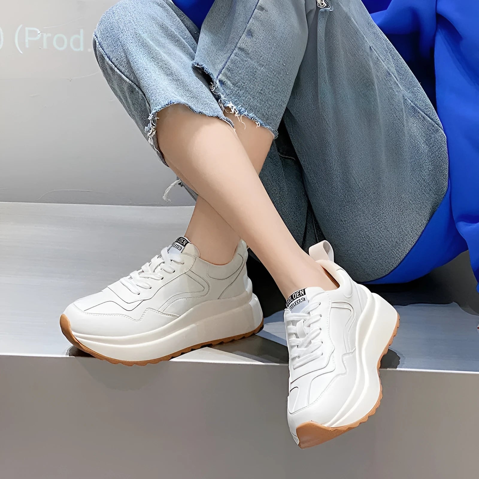 Women's beige cowhide leather casual sports shoes with round toe and cross-strap detail.