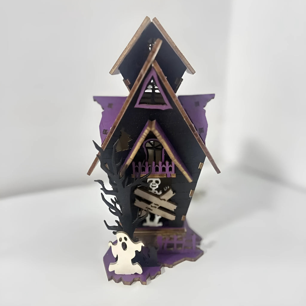 Wooden glowing haunted house Halloween table decoration with candlestick holder, 14cm wide.