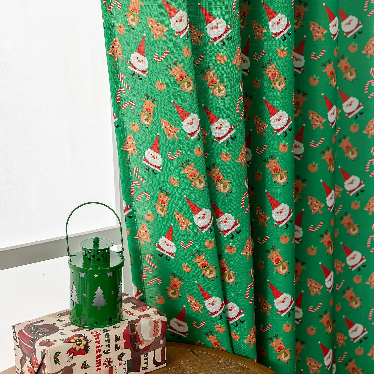 Red American-style cloth curtain with printed cartoon angels and snowmen, one metre wide.
