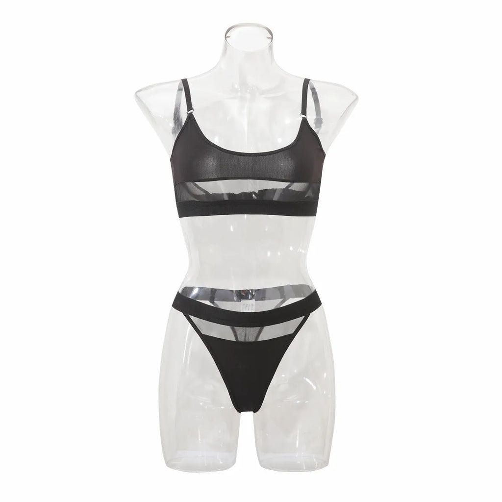 Women's black and white underwear set with full-cup bra and matching panties