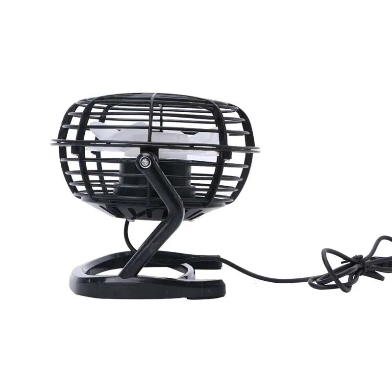 Small black USB desk fan with adjustable head and key switch on a wooden desk.