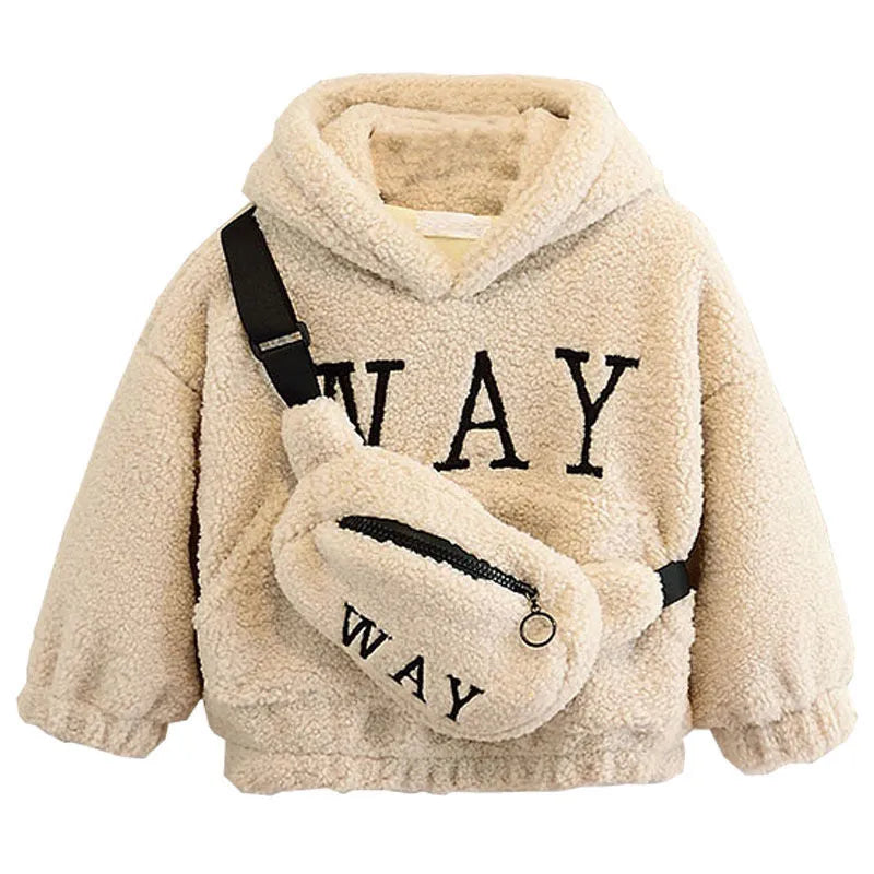 Child wearing a beige fleece jacket with cartoon prints and an attached hood.