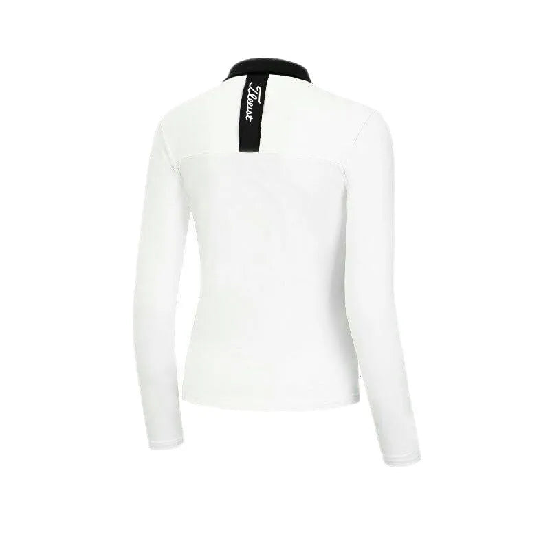 Women's slim-fit long sleeve golf top in black, made from breathable polyester fabric for sun protection.