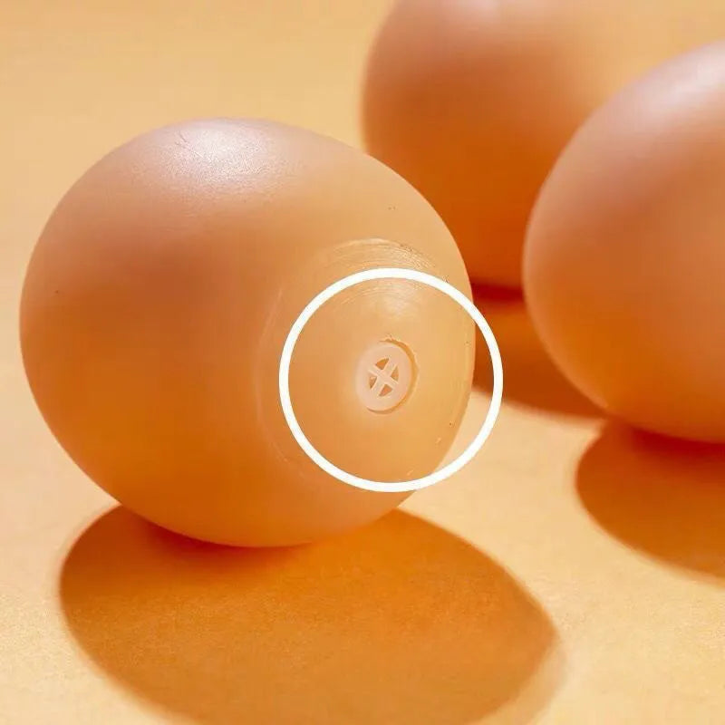 Natural rubber egg-shaped dog chew toy with a squeaker inside for dental play.