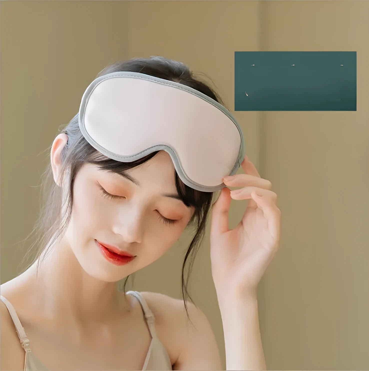 Pink and green portable eye massage goggles with steam and heating functions