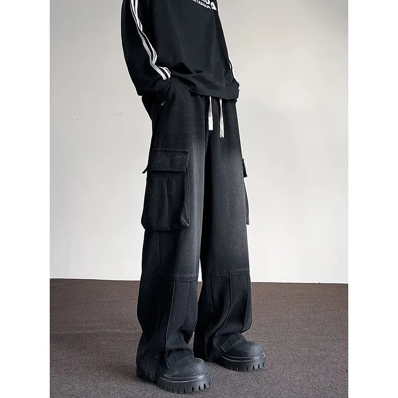 Washed vintage denim men's casual wide-leg pants with drawstring waist and multiple pockets, blue colour, front view