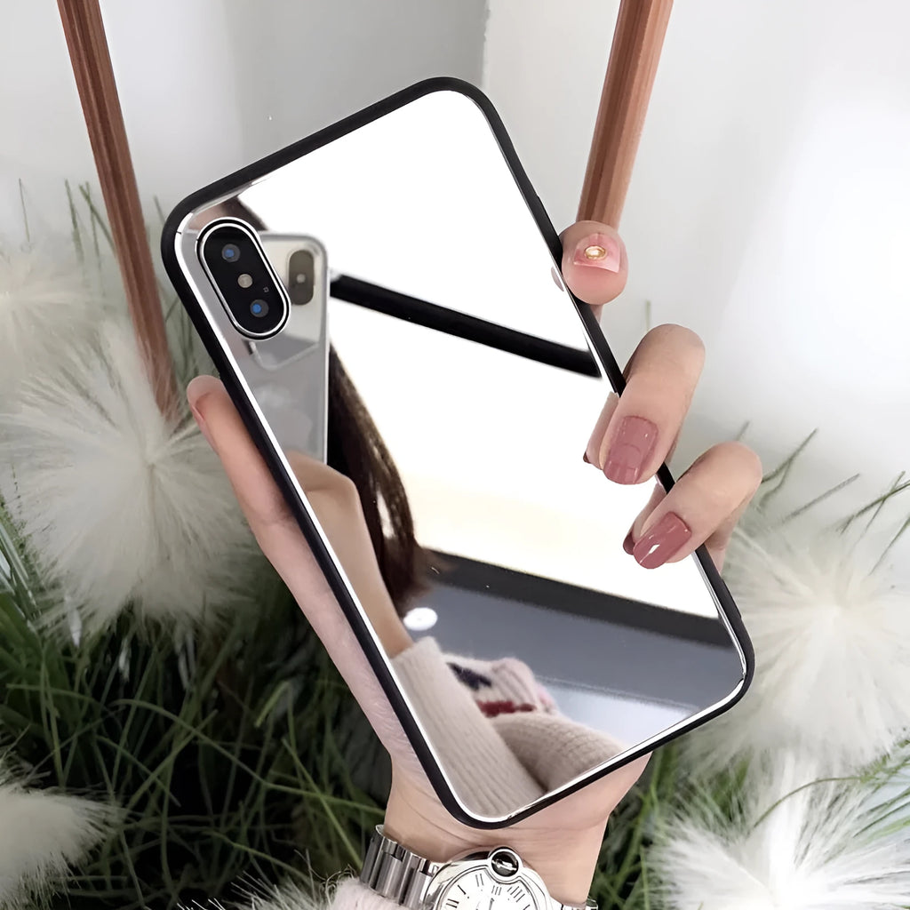 Black iPhone back cover case with a reflective mirror surface and self-timer function.