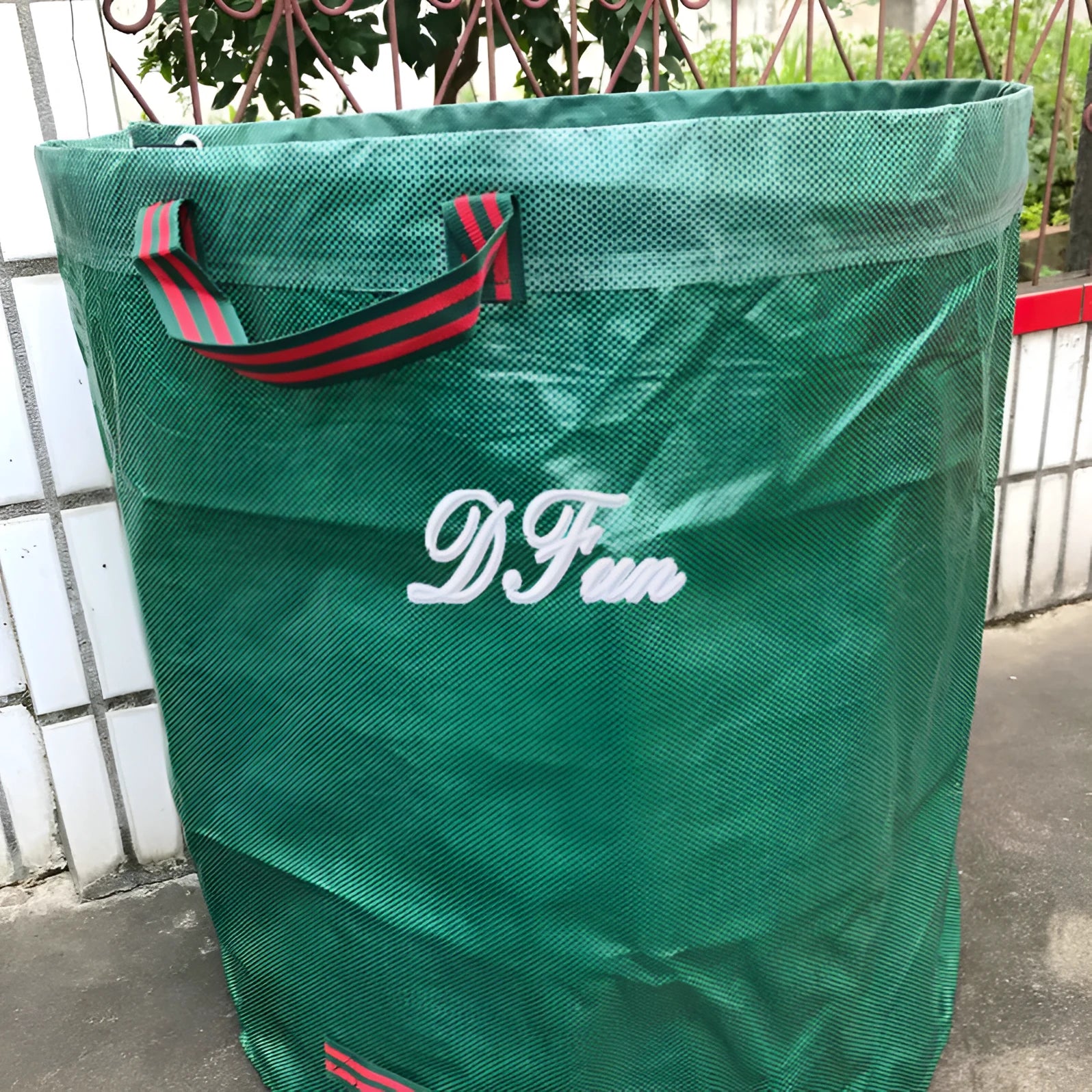 Green garden leaf bag made from PP plastic with multiple size options for garden waste collection