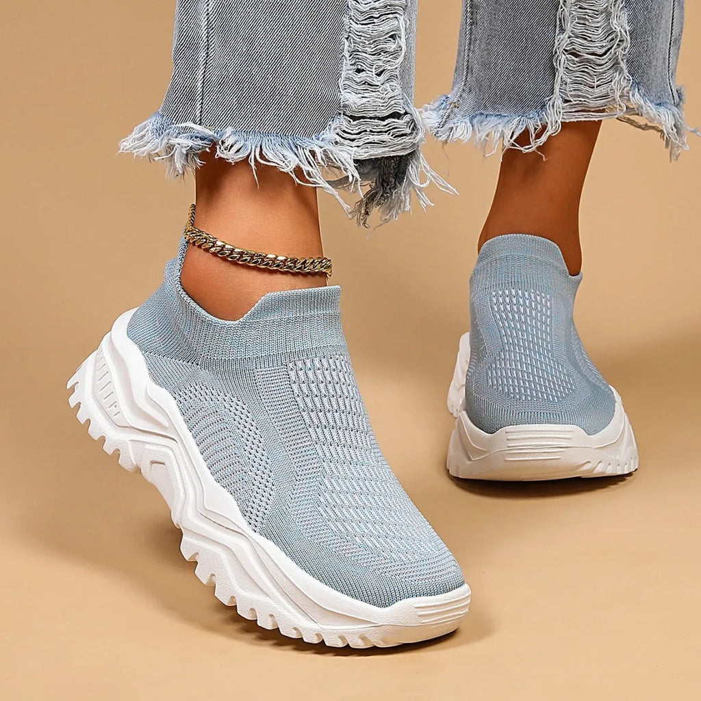 Light blue women's mesh slip-on sports shoes with round toe and mid heel