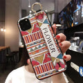 Rose flower pattern phone case with integrated wrist strap for Apple iPhone models.