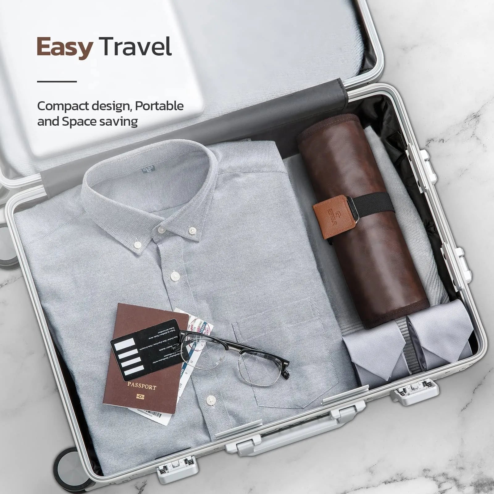 Men's black PU travel wash bag with portable reel design for toiletry organisation