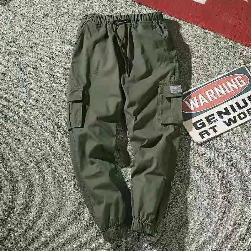 Men's loose-legged cotton casual trousers in camouflage and solid colours, sizes S to 7XL.