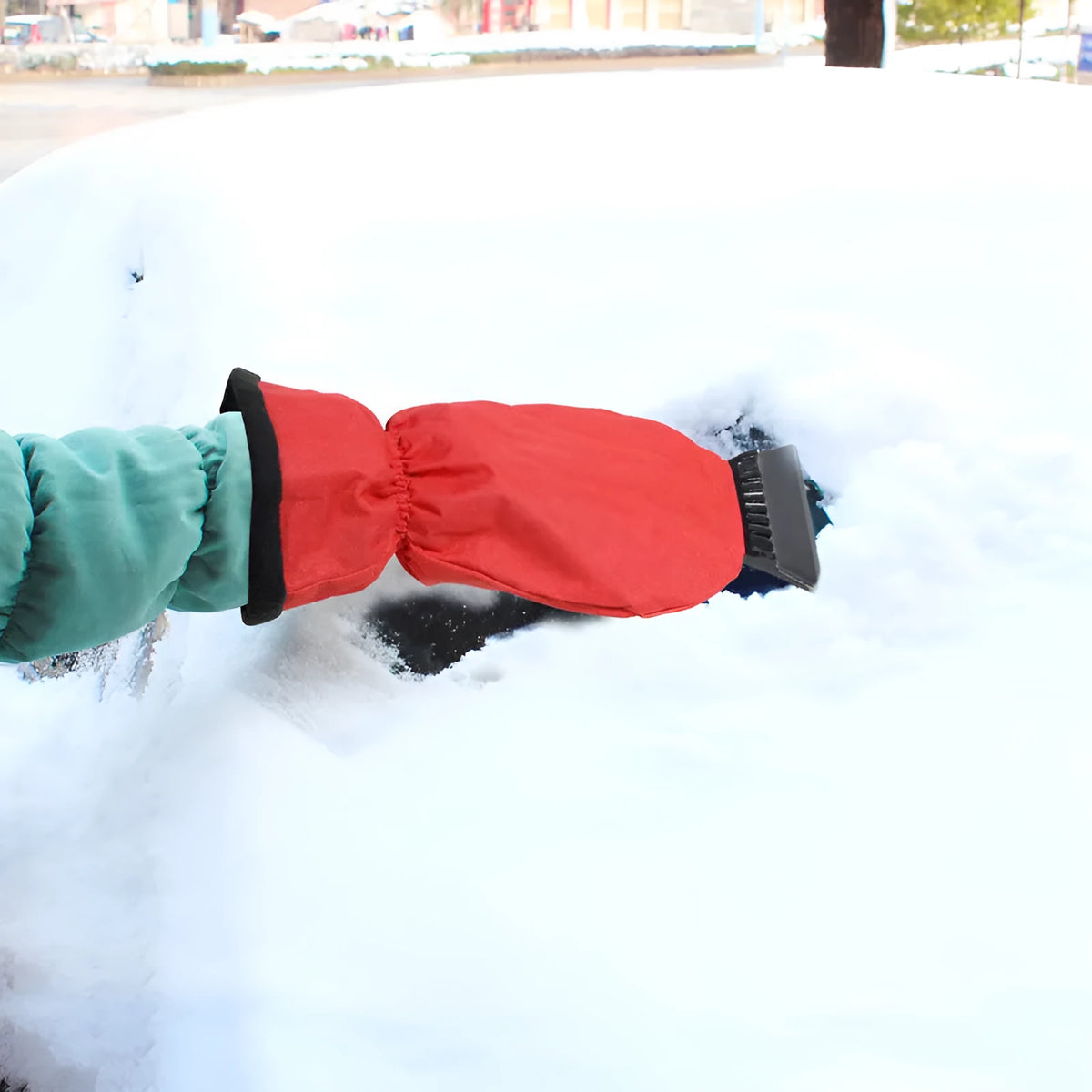 Red and blue car snow plough shovel with ice scraper edge and wide blade