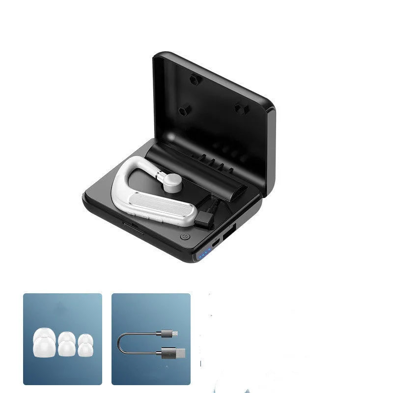 Black Bluetooth hanging earphones with charging warehouse and three pairs of ear caps on a white background