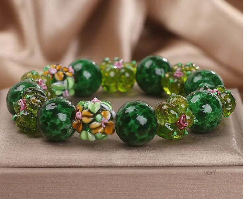Chinese ancient flower glazed bracelet for women, green electroplated finish with floral charm