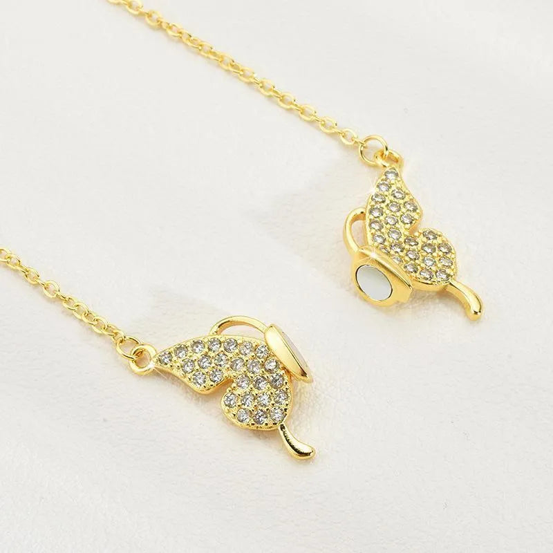Gold titanium steel clavicle chain necklace with magnetic butterfly pendant on twisted chain