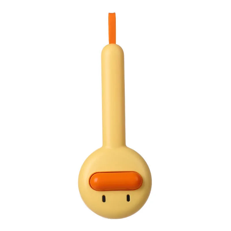 Small yellow duck-shaped pet grooming comb with open needle brush for cats and dogs