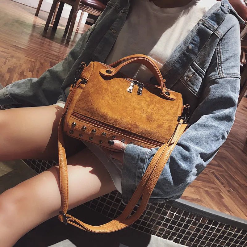 Soft PU casual women's tote shoulder bag in a neutral colour with zip closure.