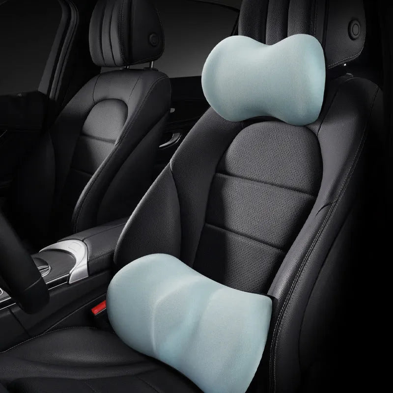 Car seat headrest pillow with ingot design and matching lumbar support cushion in grey colour