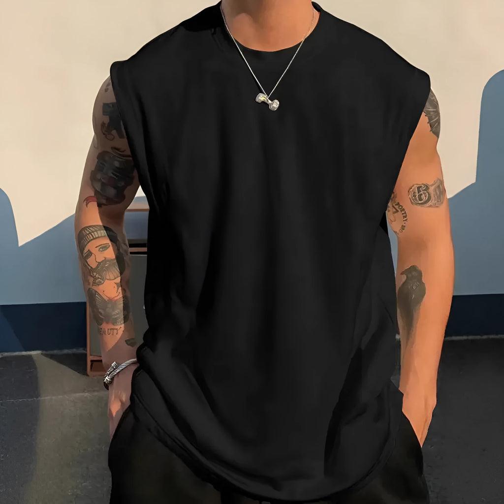 Men's loose solid colour cotton pullover tank top on a hanger, showing sleeveless design.