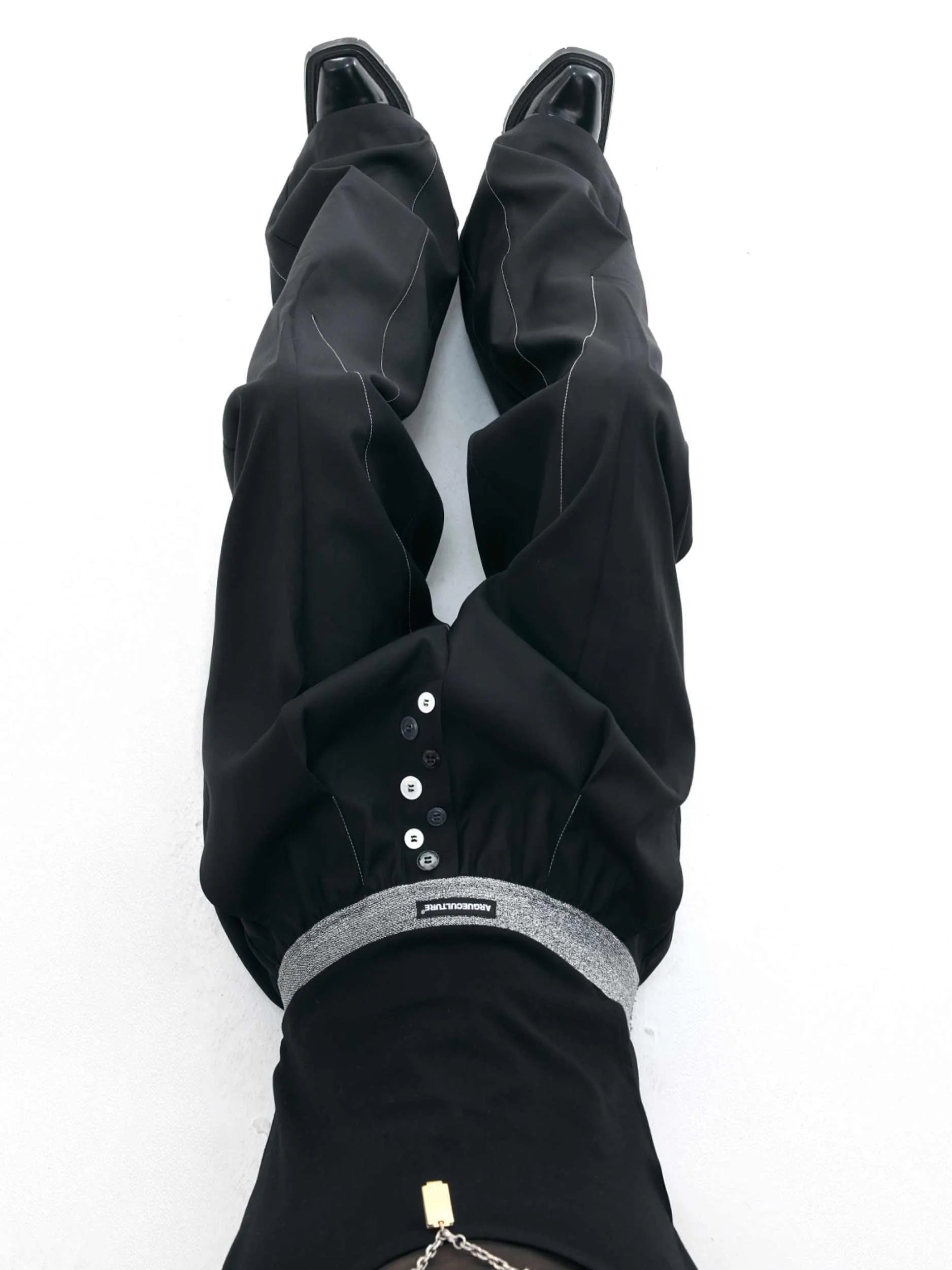 Straight-leg high-waisted casual trousers with button open line detail in black and grey colours