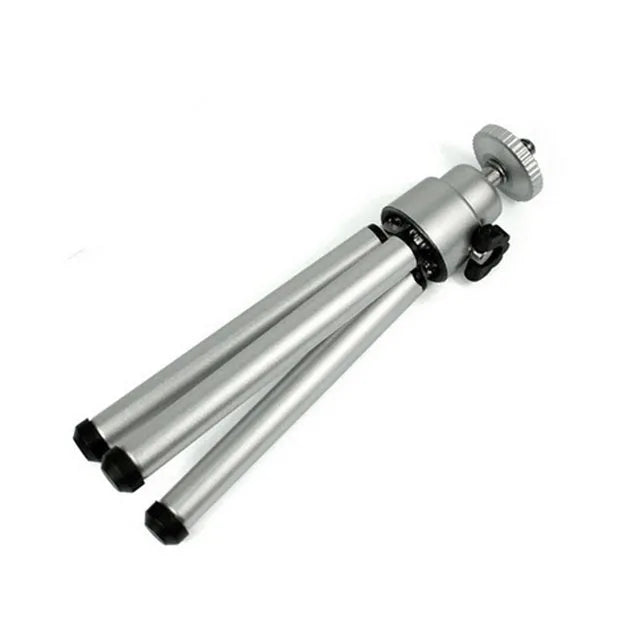 Mini flexible aluminium tripod with ball head and separate phone clip on desktop