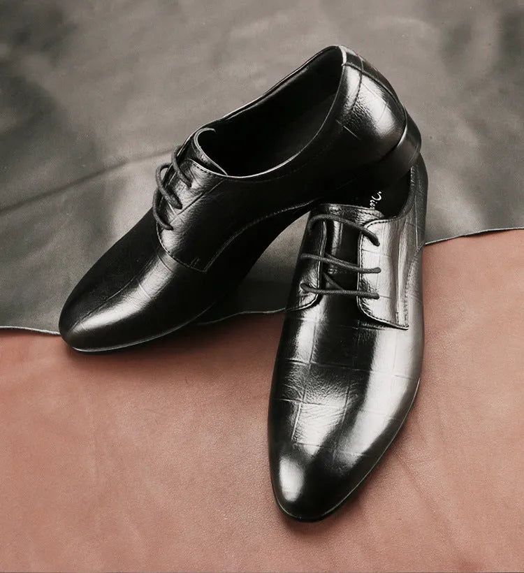 Men's black leather derby shoes with checkered detailing and pointed toe