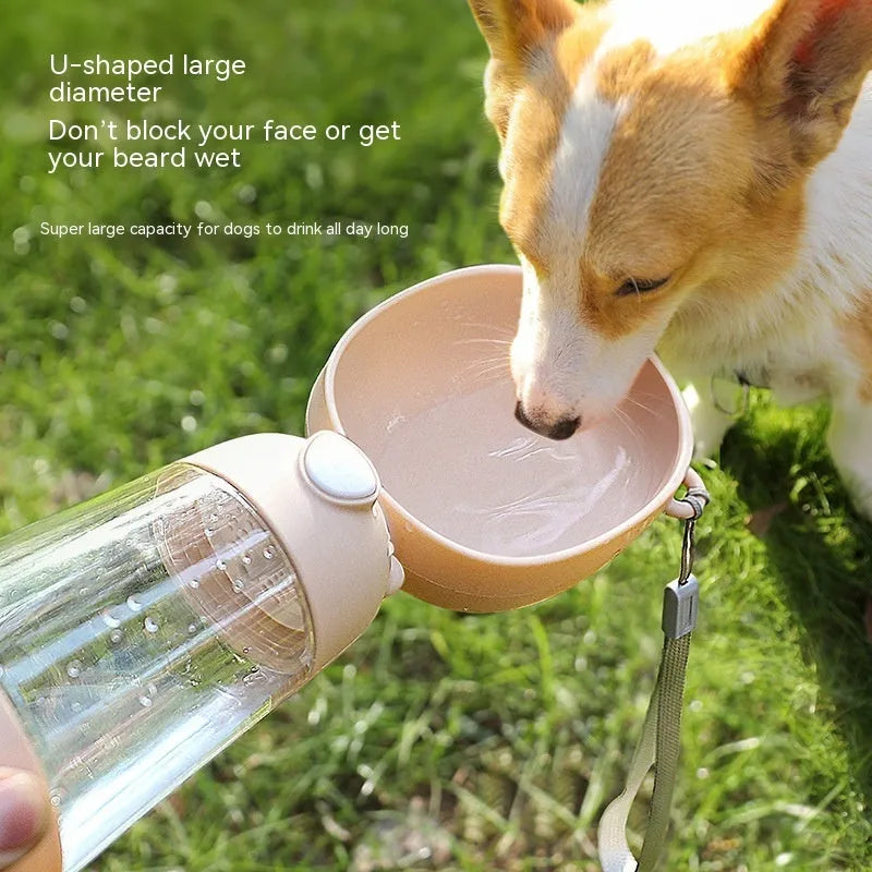 Portable dog water bottle and food container for outdoor pet travel in brown pink yellow colour options