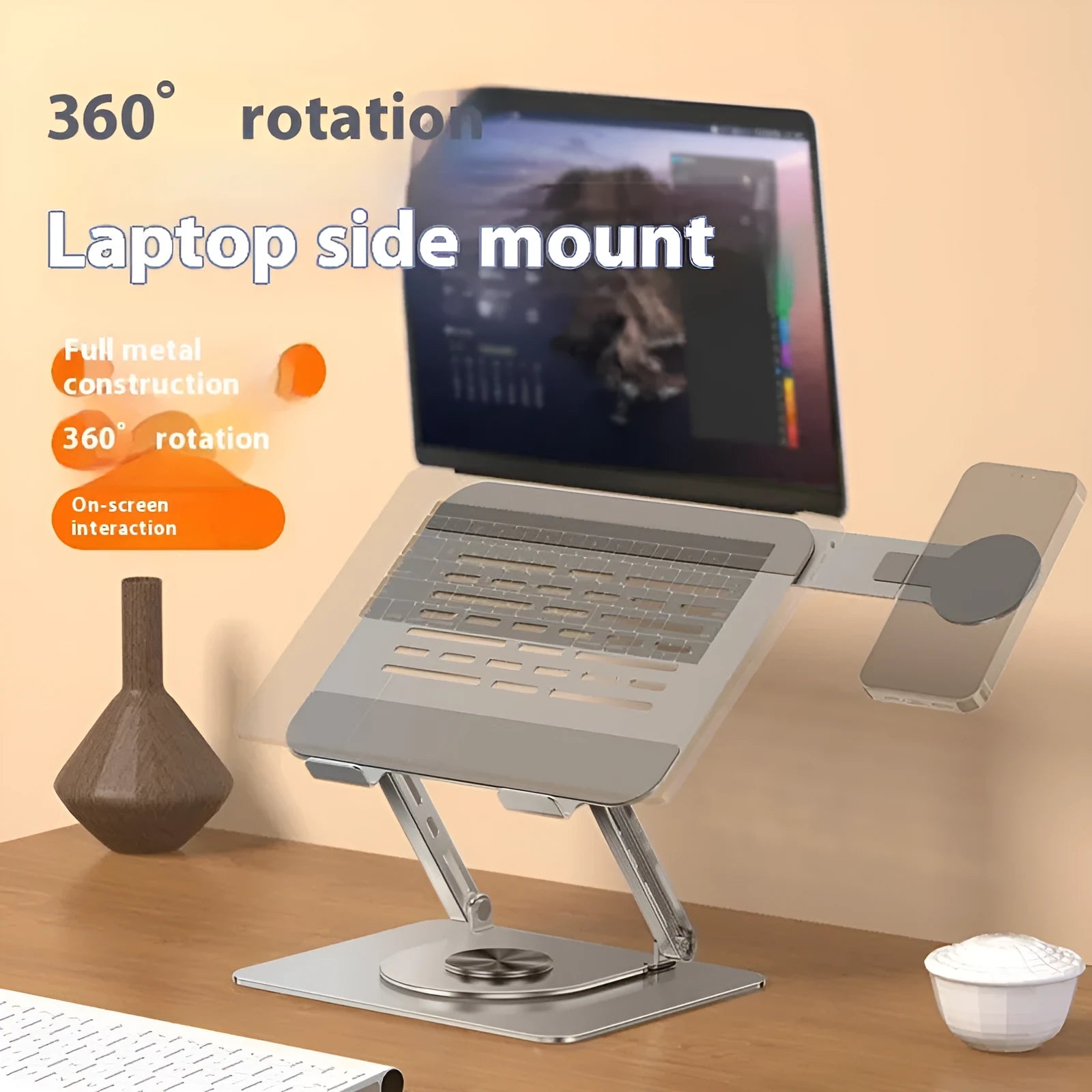Silver carbon steel laptop stand with rotating platform and side-mounted magnetic phone holder