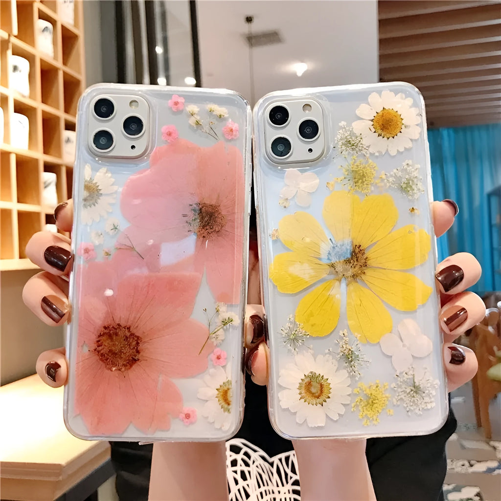Floral TPU iPhone case with large pink and yellow flower patterns on back cover.