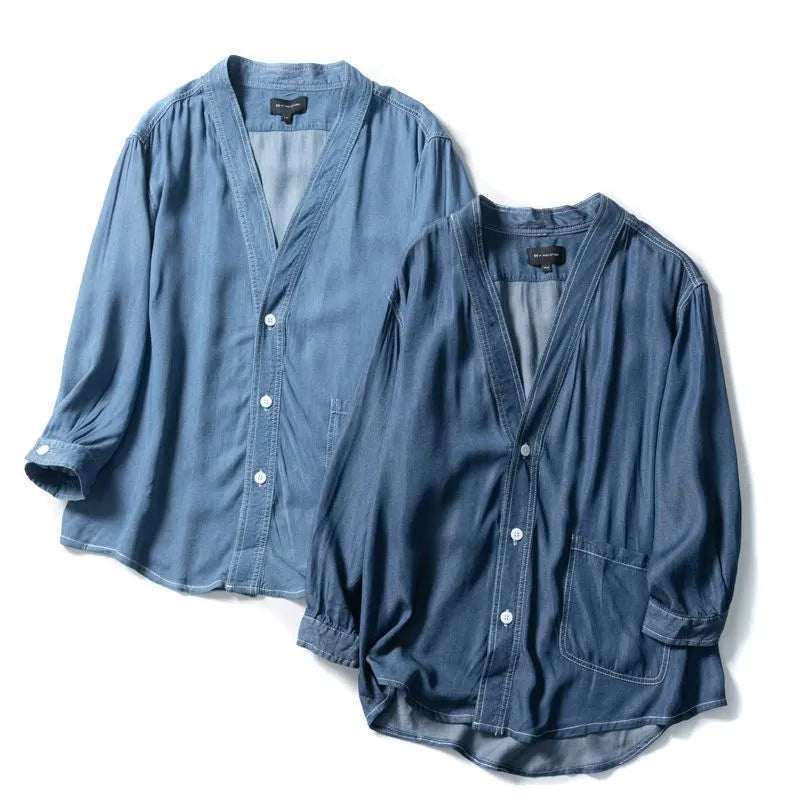 Men's dark blue casual denim coat with V-neck collar and chest pocket on a hanger.