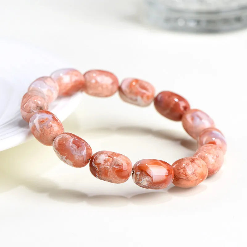Natural cherry agate barrel bead bracelet with geometric 10x14mm beads and ruyi design