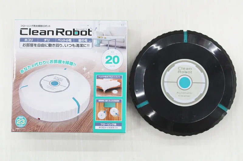 AC robot vacuum cleaner automatic sweeping machine in black or white on a hardwood floor.