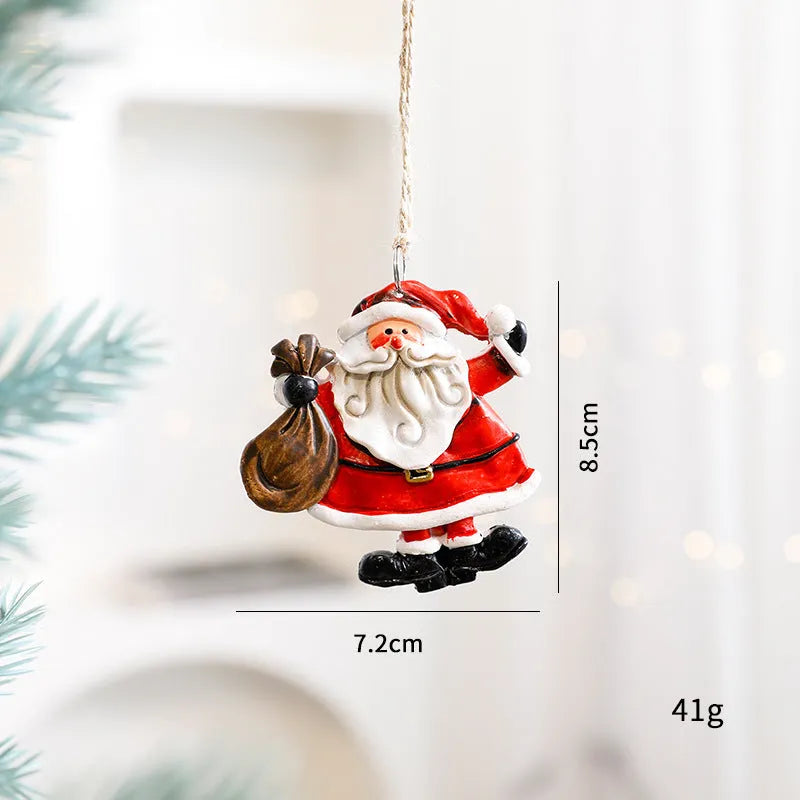 Small resin Christmas pendant ornament biscuit man figure with love motif on festive tree