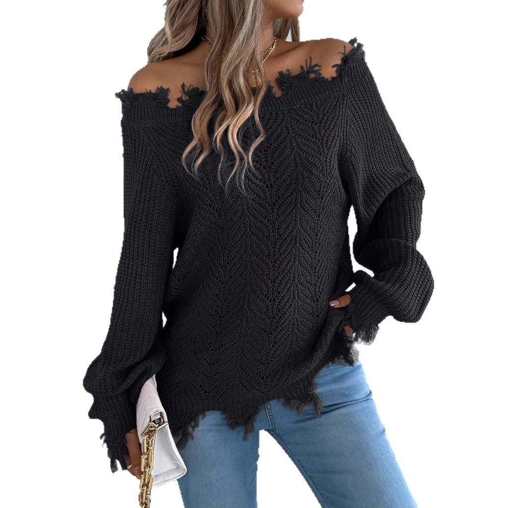 White women's pullover sweater with cut-off-the-shoulder neckline and hollow-out patterned long sleeves.