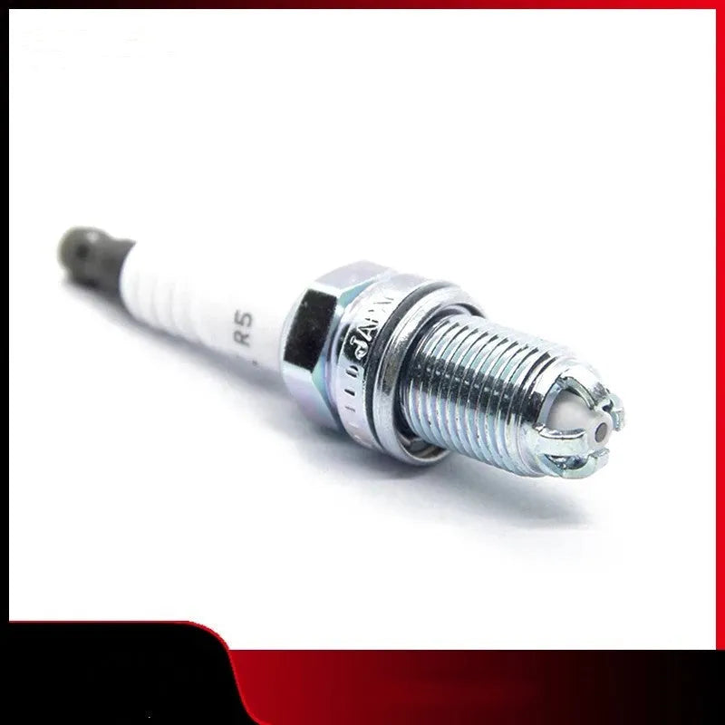 Silver automotive spark plug with 3 kiloohm resistance for BMW, Mini, and Rolls Royce automatic transmission vehicles