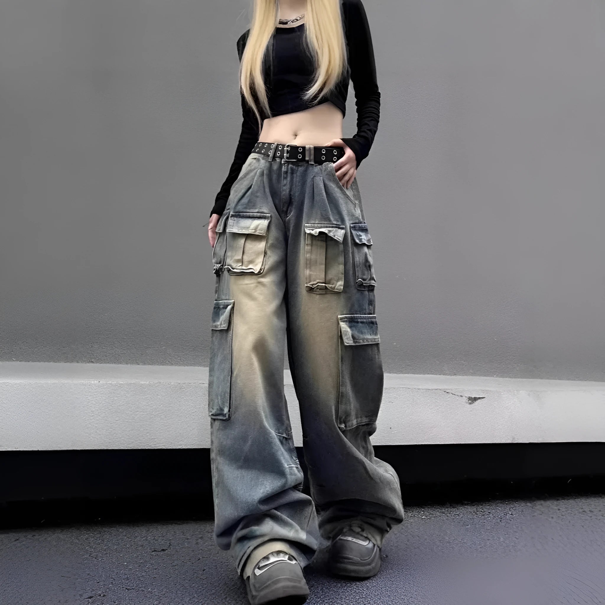 Loose straight-leg distressed jeans with multiple pockets in light blue denim fabric