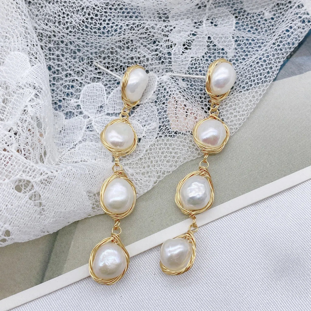 Handmade natural pearl drop earrings with tassel detailing in white colour for women
