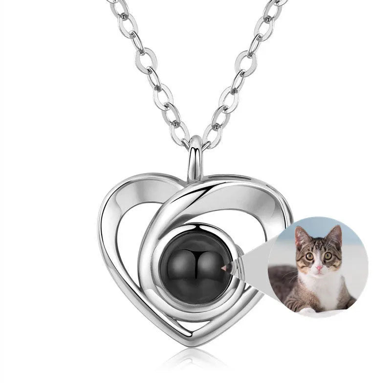 S925 silver heart shaped photo projection pendant necklace with silver finish on white background