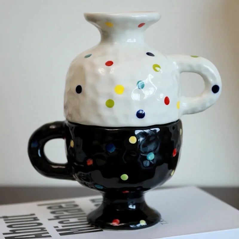 Hand-pinched irregular shaped ceramic mug in solid colour with 250ml capacity