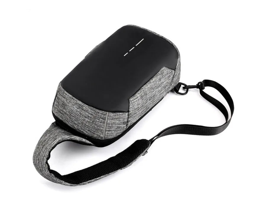 Oxford cloth waterproof chest bag showing front zipper opening and adjustable strap in dark blue colour