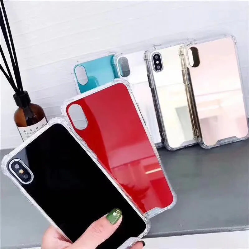 Mirror finish iPhone case with reflective surface showing TPU flexible construction and precise port cutouts